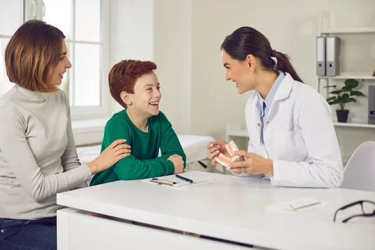 child enjoying a fun and stress-free visit at a pediatric dental office near you
