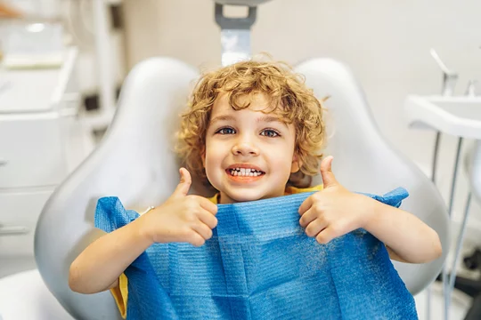 confident child showing off a bright healthy smile after visiting a pediatric dentist in smyrna, tn